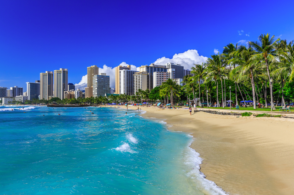 Take a stroll on Waikiki's shoreline with white sandy beaches and warm ocean waters Take a stroll on Waikiki's shoreline with white sandy beaches and warm ocean waters