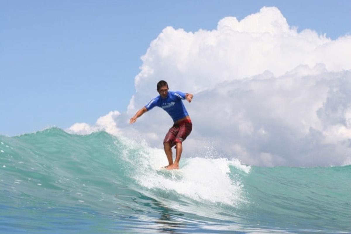 Male surfer riding a wave