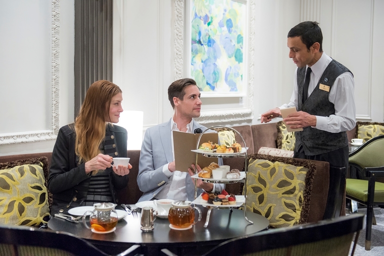People having tea